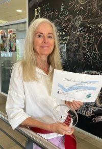 Jeanette Gilks with her certificate.